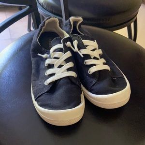 Black slip-on sneakers